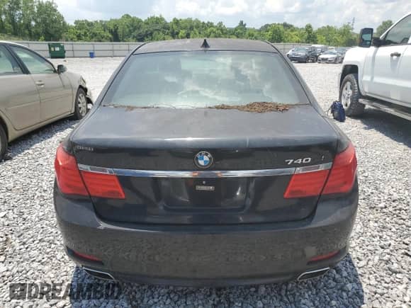 2012 BMW 7 Series 740Li with VIN WBAKB4C55CC577012, listed as a Copart auction lot 62151725 with 111,320 mi miles and Salvage title. Bid and sale history available at DreamBid. Image 6.