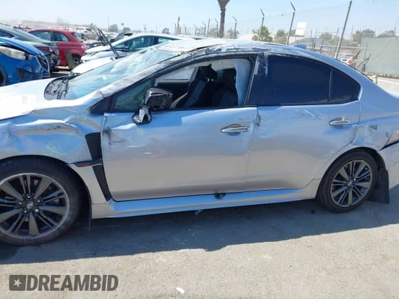 2017 Subaru WRX z VIN JF1VA1B66H9833583, wystawiony jako IAAI lot #43067415 z przebiegiem 80 509 mil mil oraz . Historia ofert i sprzedaży dostępna na DreamBid. Obrazek 14.