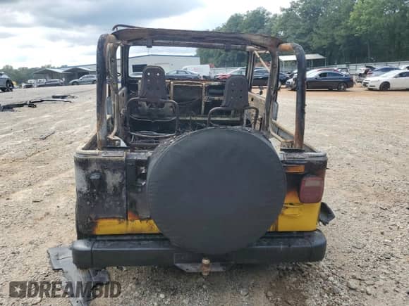 2000 Jeep Wrangler SE with VIN 1J4FA29P9YP787126, listed as a Copart auction lot 69889405 with Not provided miles and Non repairable. Bid and sale history available at DreamBid. Image 6.