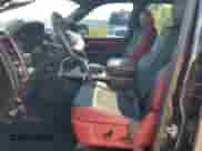 2016 Ram 1500 Rebel z VIN 1C6RR7YT1GS122621, wystawiony jako Copart lot #69390835 z przebiegiem 144 898 mil mil oraz Czysty tytuł • Clean title. Historia ofert i sprzedaży dostępna na DreamBid. Obrazek 7.