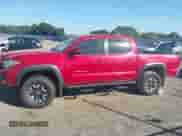 2019 Toyota Tacoma SR5 with VIN 3TMAZ5CNXKM102209, listed as a IAAI auction lot 43392417 with 94,767 mi miles and . Bid and sale history available at DreamBid. Image 14.