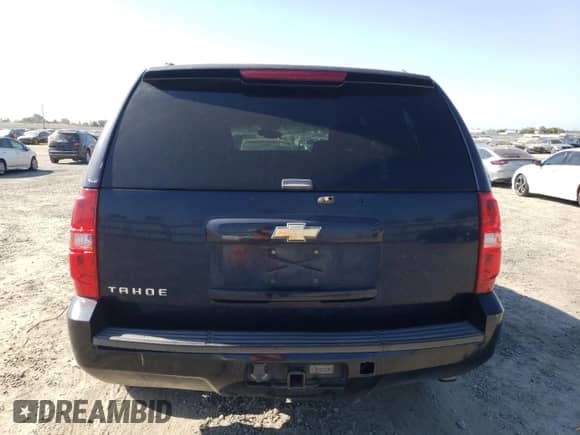 2007 Chevrolet Tahoe LS z VIN 1GNFC13C57R378521, wystawiony jako Copart lot #69067935 z przebiegiem 201 340 mil mil oraz Czysty tytuł • Clean title. Historia ofert i sprzedaży dostępna na DreamBid. Obrazek 6.