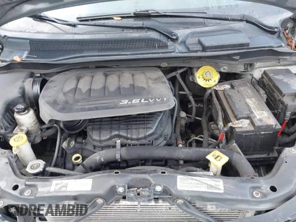 2014 Dodge Grand Caravan SE 30th Anniversary with VIN 2C4RDGBG5ER223968, listed as a IAAI auction lot 43228772 with 164,167 mi miles and . Bid and sale history available at DreamBid. Image 10.