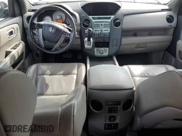 2011 Honda Pilot Touring с VIN 5FNYF3H98BB017185, выставлен на аукционе Copart как лот 68420775 с пробегом 204 719 миль миль и На запчасти • Non repairable. История ставок и продаж доступна на DreamBid. Изображение 8.