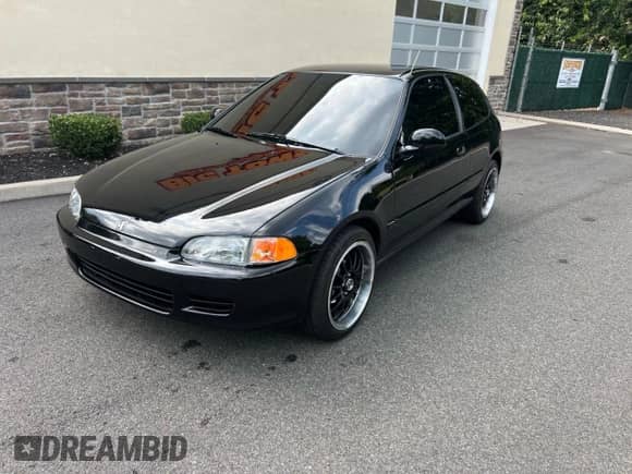 1992 Honda Civic with VIN 2HGEH2457NH561798, listed as a Copart auction lot 69810895 with 201,079 mi miles and Clean title. Bid and sale history available at DreamBid. Image 2.