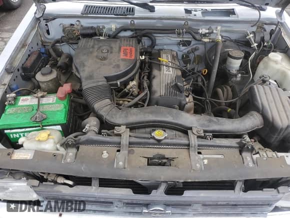 1991 Nissan Frontier z VIN 1N6SD11SXMC311083, wystawiony jako Copart lot #83971835 z przebiegiem 112 789 mil mil oraz Szkoda całkowita • Salvage title. Historia ofert i sprzedaży dostępna na DreamBid. Obrazek 11.