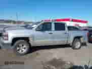 2014 Chevrolet Silverado 1500 LT z VIN 3GCUKREC9EG141445, wystawiony jako IAAI lot #41357325 z przebiegiem 158 604 mil mil oraz . Historia ofert i sprzedaży dostępna na DreamBid. Obrazek 14.