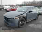 2022 Mazda CX-5 S Carbon Edition z VIN JM3KFBCM9N1538707, wystawiony jako IAAI lot #42026877 z przebiegiem 36 077 mil mil oraz . Historia ofert i sprzedaży dostępna na DreamBid. Obrazek 2.