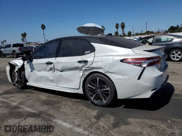 2018 Toyota Camry XSE с VIN 4T1BZ1HK7JU010492, выставлен на аукционе Copart как лот 71482645 с пробегом 77 969 миль миль и Списание • Salvage title. История ставок и продаж доступна на DreamBid. Изображение 2.