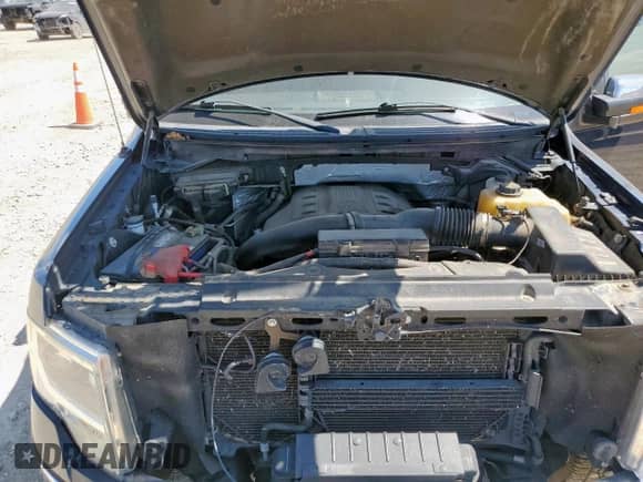 2013 Ford F-150 Lariat with VIN 1FTFW1ET0DFA15540, listed as a Copart auction lot 81657825 with 101,983 mi miles and Salvage title. Bid and sale history available at DreamBid. Image 11.