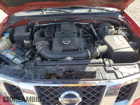 2009 Nissan Frontier SE with VIN 1N6AD07W59C425693, listed as a Copart auction lot 69923245 with 124,476 mi miles and Salvage title. Bid and sale history available at DreamBid. Image 11.