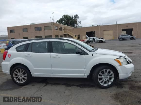 2011 Dodge Caliber Heat with VIN 1B3CB5HA1BD172908, listed as a IAAI auction lot 43438551 with 153,540 mi miles and . Bid and sale history available at DreamBid. Image 13.