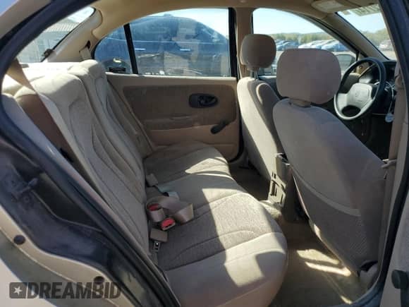 2002 Saturn SL with VIN 1G8ZK527X2Z196501, listed as a Copart auction lot 76672714 with 69,103 mi miles and Salvage title. Bid and sale history available at DreamBid. Image 10.