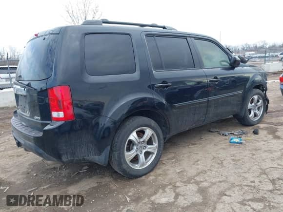2014 Honda Pilot EX-L with VIN 5FNYF4H71EB007543, listed as a IAAI auction lot 41686545 with 147,082 mi miles and . Bid and sale history available at DreamBid. Image 4.
