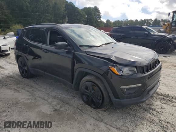 2019 Jeep Compass Altitude with VIN 3C4NJCBB5KT676730, listed as a Copart auction lot 85666565 with 123,853 mi miles and Clean title. Bid and sale history available at DreamBid. Image 4.