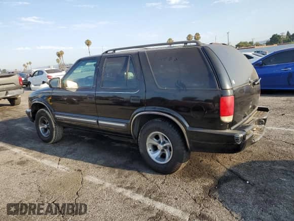 2000 Chevrolet Blazer LT с VIN 1GNCS13W7Y2173339, выставлен на аукционе Copart как лот 65621135 с пробегом 141 725 миль миль и Списание • Salvage title. История ставок и продаж доступна на DreamBid. Изображение 2.