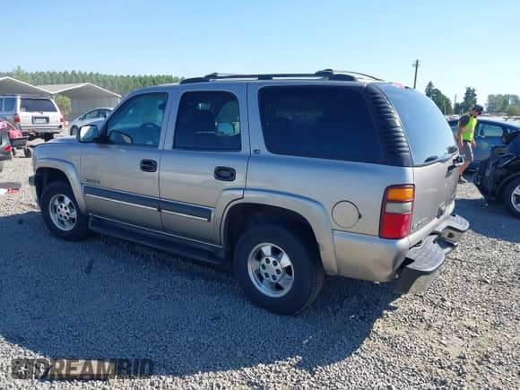 2002 Chevrolet Tahoe Z71 with VIN 1GNEK13Z62R164987, listed as a IAAI auction lot 42769028 with 265,220 mi miles and . Bid and sale history available at DreamBid. Image 3.