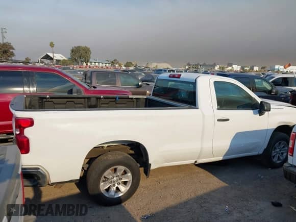 2020 Chevrolet Silverado 1500 Work Truck with VIN 3GCNWAEF2LG263811, listed as a IAAI auction lot 41201584 with 40,165 mi miles and . Bid and sale history available at DreamBid. Image 13.