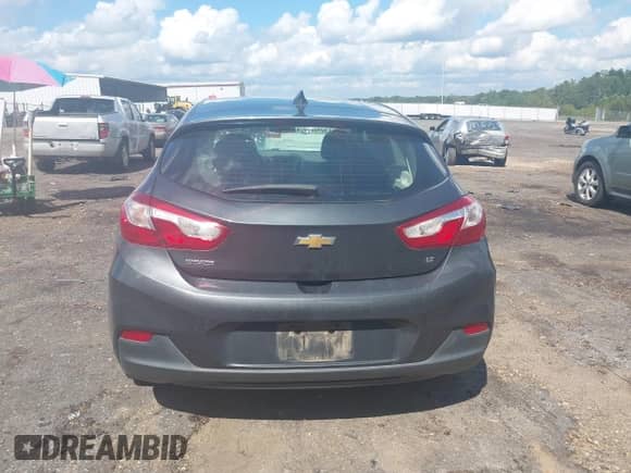 2017 Chevrolet Cruze LT z VIN 3G1BE6SM3HS554966, wystawiony jako IAAI lot #43252261 z przebiegiem 172 023 mil mil oraz . Historia ofert i sprzedaży dostępna na DreamBid. Obrazek 16.