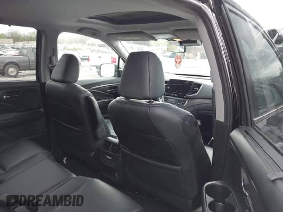 2022 Honda Pilot EX-L with VIN 5FNYF5H55NB038699, listed as a IAAI auction lot 41967073 with 58,097 mi miles and . Bid and sale history available at DreamBid. Image 8.