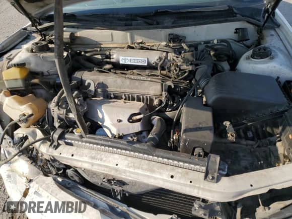 1995 Toyota Camry LE z VIN 4T1SK12E8SU548580, wystawiony jako Copart lot #64808935 z przebiegiem 166 718 mil mil oraz Szkoda całkowita • Salvage title. Historia ofert i sprzedaży dostępna na DreamBid. Obrazek 11.