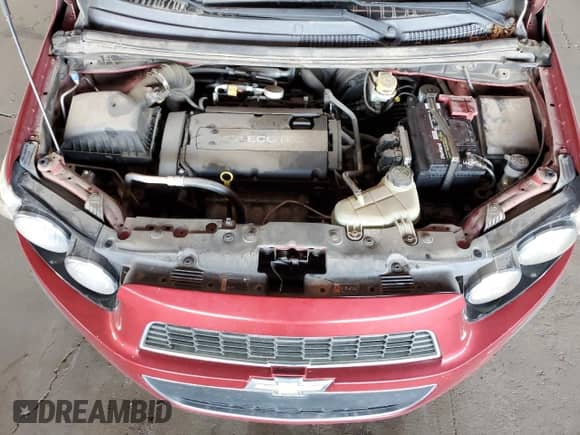 2012 Chevrolet Sonic LT z VIN 1G1JD6SH1C4170016, wystawiony jako Copart lot #77184494 z przebiegiem 127 311 mil mil oraz Czysty tytuł • Clean title. Historia ofert i sprzedaży dostępna na DreamBid. Obrazek 11.