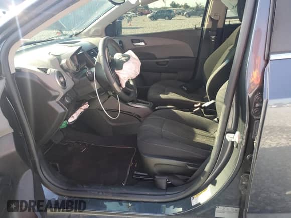 2012 Chevrolet Sonic LT с VIN 1G1JC6SH8C4177385, выставлен на аукционе Copart как лот 70322405 с пробегом Не указан миль и Списание • Salvage title. История ставок и продаж доступна на DreamBid. Изображение 7.