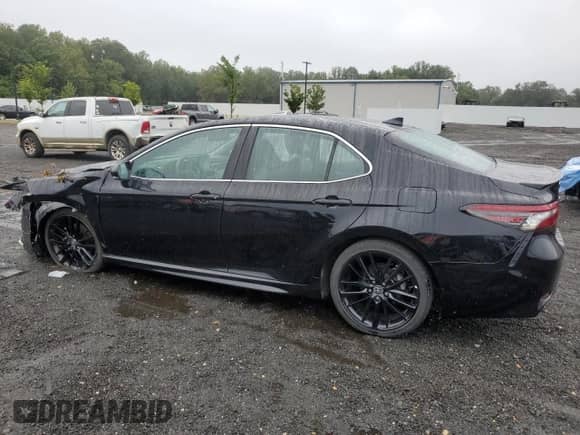 2023 Toyota Camry Hybrid XSE с VIN 4T1K31AK0PU614339, выставлен на аукционе Copart как лот 68635715 с пробегом 87 939 миль миль и Списание • Salvage title. История ставок и продаж доступна на DreamBid. Изображение 2.