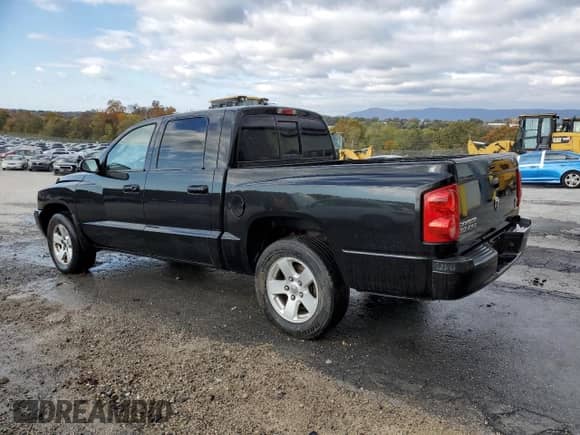 2007 Dodge Dakota SLT с VIN 1D7HW48PX7S199993, выставлен на аукционе Copart как лот 84012285 с пробегом 167 892 миль миль и Чистый • Clean title. История ставок и продаж доступна на DreamBid. Изображение 2.