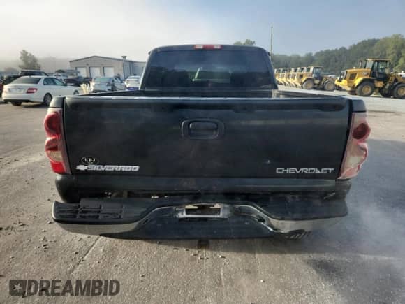 2003 Chevrolet Silverado 1500 LS with VIN 1GCEK19V73E243249, listed as a Copart auction lot 81747595 with 294,382 mi miles and Salvage title. Bid and sale history available at DreamBid. Image 6.