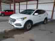 2018 Hyundai Santa Fe 2.4L z VIN 5XYZT3LB5JG516329, wystawiony jako IAAI lot #43392532 z przebiegiem 94 128 mil mil oraz . Historia ofert i sprzedaży dostępna na DreamBid. Obrazek 17.