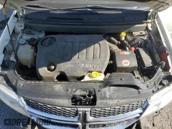 2014 Dodge Journey SXT with VIN 3C4PDCBG4ET296732, listed as a Copart auction lot 67479975 with 244,286 mi miles and Salvage title. Bid and sale history available at DreamBid. Image 12.