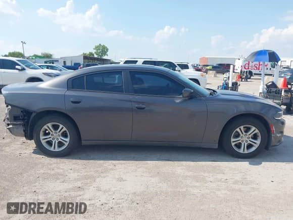 2015 Dodge Charger SE with VIN 2C3CDXBGXFH735601, listed as a IAAI auction lot 43106037 with 116,702 mi miles and . Bid and sale history available at DreamBid. Image 13.