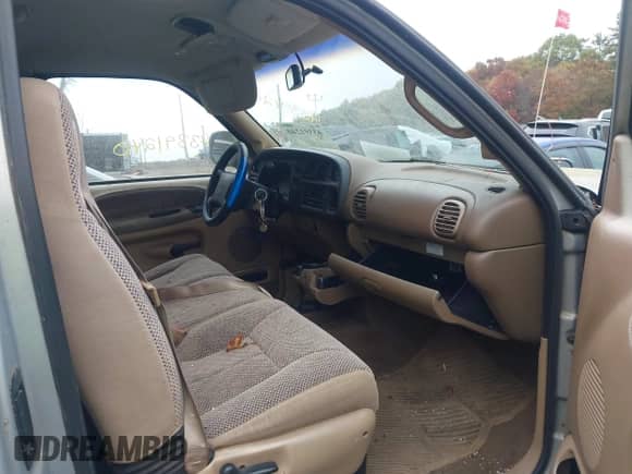 1999 Dodge 1500 z VIN 1B7HF13Y6XJ584918, wystawiony jako IAAI lot #43391240 z przebiegiem 130 238 mil mil oraz . Historia ofert i sprzedaży dostępna na DreamBid. Obrazek 5.