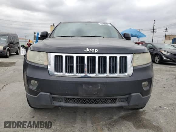 2011 Jeep Grand Cherokee Laredo with VIN 1J4RS4GG5BC569482, listed as a Copart auction lot 83758495 with 108,452 mi miles and Clean title. Bid and sale history available at DreamBid. Image 5.