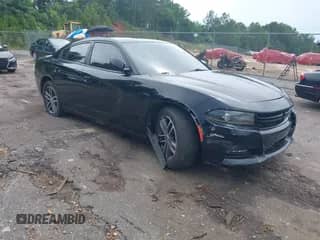 2019 Dodge Charger SXT with VIN 2C3CDXJG0KH757957, listed as a IAAI auction lot 42498530 with 142,878 mi miles and . Bid and sale history available at DreamBid. Image 1.