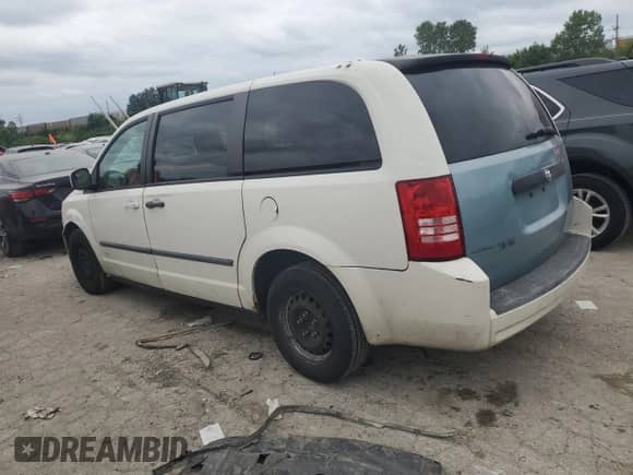 2010 Dodge Grand Caravan Cargo with VIN 2D4RN1AE2AR117114, listed as a Copart auction lot 66612434 with 92,149 mi miles and Salvage title. Bid and sale history available at DreamBid. Image 2.