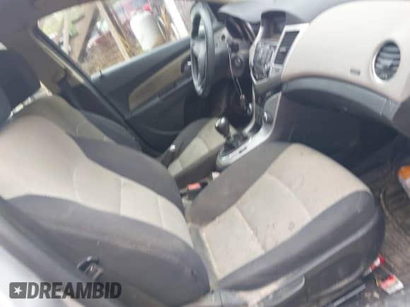 2015 Chevrolet Cruze LS with VIN 1G1PB5SG8F7288813, listed as a IAAI auction lot 42195386 with 151,425 mi miles and . Bid and sale history available at DreamBid. Image 5.