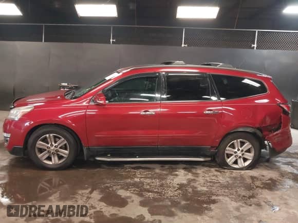 2014 Chevrolet Traverse LT z VIN 1GNKVGKD3EJ311157, wystawiony jako IAAI lot #43430340 z przebiegiem 229 782 mil mil oraz . Historia ofert i sprzedaży dostępna na DreamBid. Obrazek 14.