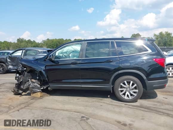 2021 Honda Pilot EX-L с VIN 5FNYF6H57MB100639, выставлен на аукционе IAAI как лот 43159275 с пробегом 88 114 миль миль и . История ставок и продаж доступна на DreamBid. Изображение 15.