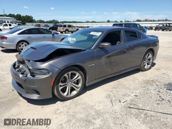2021 Dodge Charger R/T с VIN 2C3CDXCT5MH587611, выставлен на аукционе Copart как лот 70543025 с пробегом 98 075 миль миль и Списание • Salvage title. История ставок и продаж доступна на DreamBid. Изображение 1.