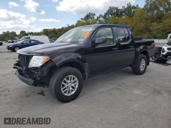 2015 Nissan Frontier SV with VIN 1N6AD0EV6FN749553, listed as a Copart auction lot 80606795 with 97,885 mi miles and Salvage title. Bid and sale history available at DreamBid. Image 1.