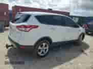 2014 Ford Escape SE z VIN 1FMCU0GX4EUD59626, wystawiony jako Copart lot #84579085 z przebiegiem 144 900 mil mil oraz Czysty tytuł • Clean title. Historia ofert i sprzedaży dostępna na DreamBid. Obrazek 3.