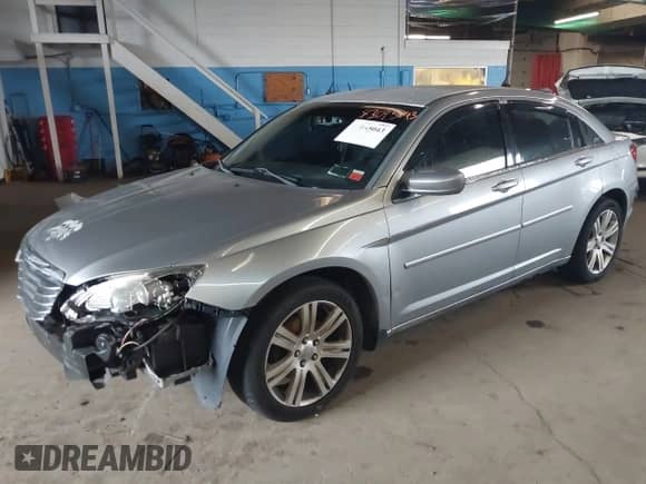 2014 Chrysler 200 Touring with VIN 1C3CCBBBXEN107554, listed as a IAAI auction lot 43045043 with 94,235 mi miles and . Bid and sale history available at DreamBid. Image 2.