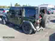 2022 Jeep Wrangler Unlimited Sport S with VIN 1C4HJXDG5NW113205, listed as a IAAI auction lot 42536399 with 30,446 mi miles and . Bid and sale history available at DreamBid. Image 3.