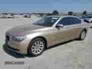 2010 BMW 7 Series 750Li xDrive with VIN WBAKC8C59AC430192, listed as a Copart auction lot 64105935 with 103,657 mi miles and Salvage title. Bid and sale history available at DreamBid. Image 1.