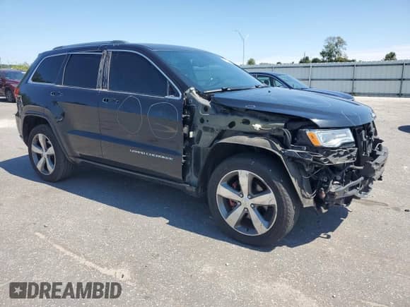 2015 Jeep Grand Cherokee Overland z VIN 1C4RJFCG6FC123955, wystawiony jako Copart lot #71092915 z przebiegiem 124 139 mil mil oraz Szkoda całkowita • Salvage title. Historia ofert i sprzedaży dostępna na DreamBid. Obrazek 4.