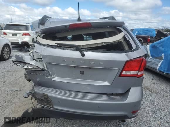 2019 Dodge Journey SE with VIN 3C4PDCBB9KT774059, listed as a Copart auction lot 86207795 with 173,245 mi miles and Non repairable. Bid and sale history available at DreamBid. Image 6.