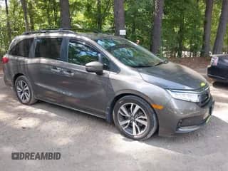 2022 Honda Odyssey Touring z VIN 5FNRL6H86NB038451, wystawiony jako IAAI lot #42868382 z przebiegiem 72 323 mil mil oraz . Historia ofert i sprzedaży dostępna na DreamBid. Obrazek 1.