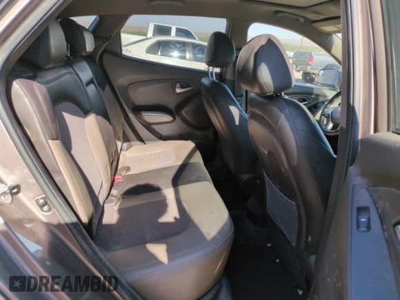 2011 Hyundai Tucson Limited with VIN KM8JUCAC1BU309681, listed as a Copart auction lot 54552335 with 180,444 mi miles and Salvage title. Bid and sale history available at DreamBid. Image 10.